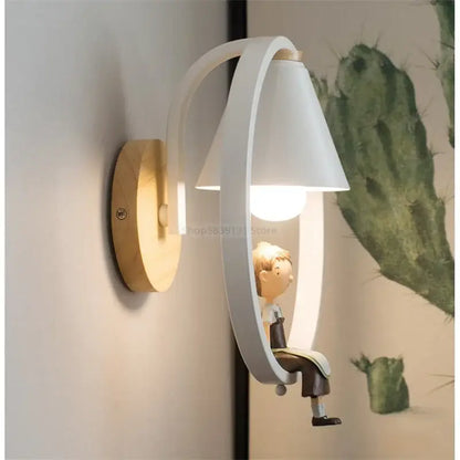 White and wood iron led wall lamps with curved cone shade and boy figurine for modern bedroom decorbites iron led design