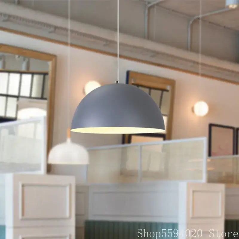 Gray dome-shaped matte iron lustre pendant light with white interior by decorbites for kitchen bar decor