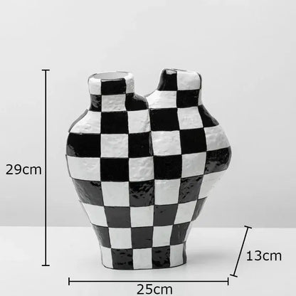 A modern black and white check ceramic vase with two necks ideal for white check room decor by decorbites black white