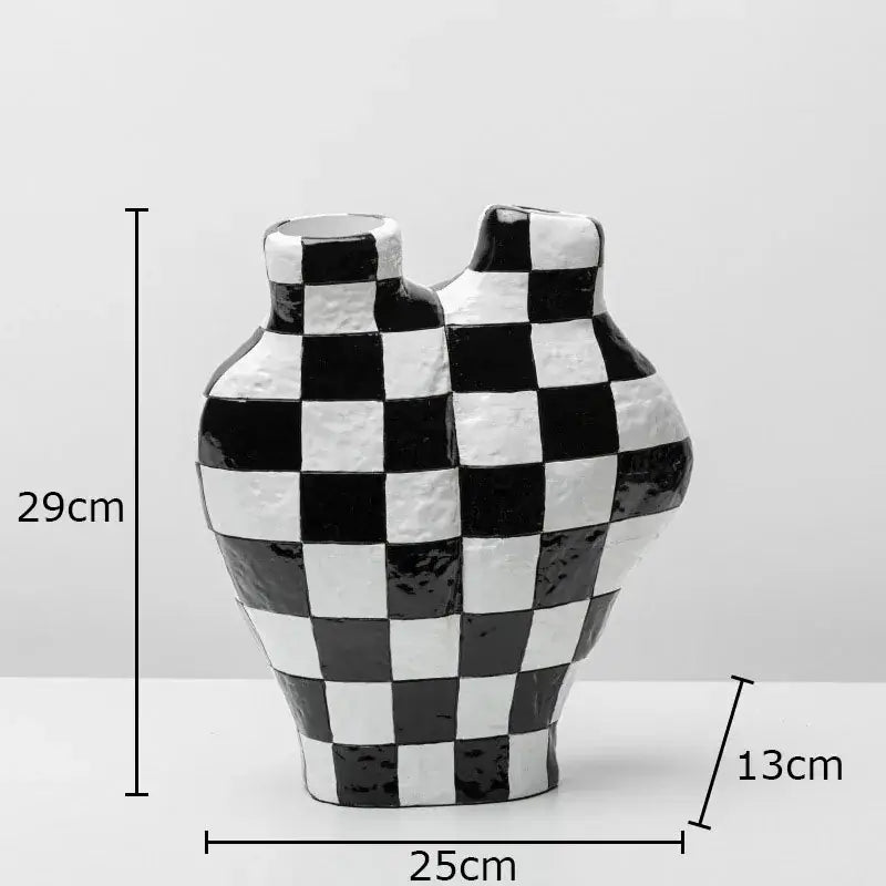 A modern black and white check ceramic vase with two necks ideal for white check room decor by decorbites black white