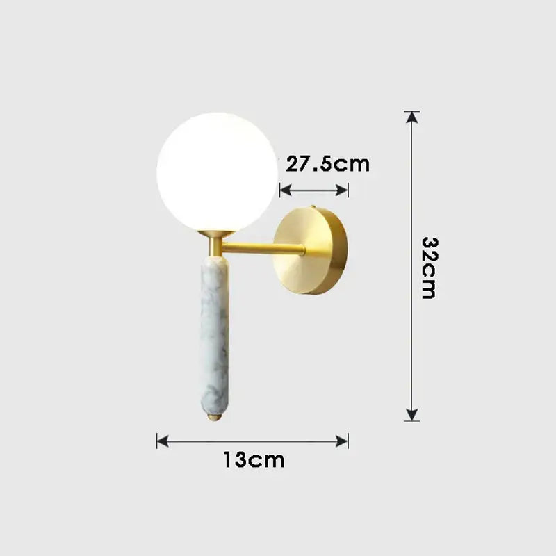 Modern italian green marble wall lamp with frosted glass globe, gold-toned arm, and marble-patterned stem for bedroom decorbites