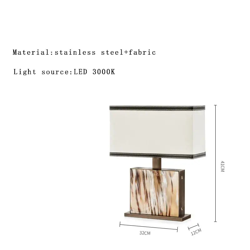 Modern rectangular table lamp with cream fabric shade black trim and stainless steel marbled base for italian luxury table decorbites