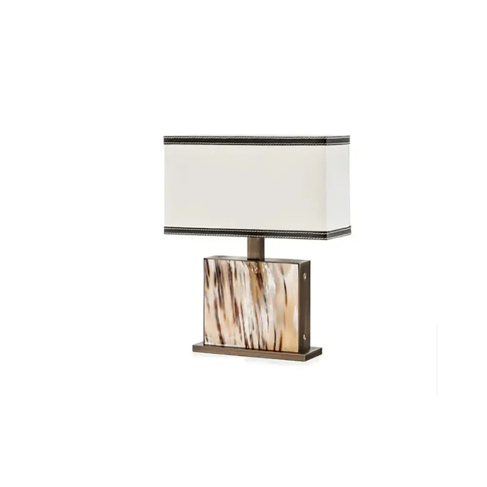 Elegant modern italian luxury table lamp with cream fabric shade black leather trim and polished horn square base for decorbites
