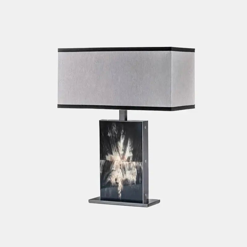 Modern italian luxury table lamp with gray fabric shade and black metal base featuring abstract photographic print for decorbites