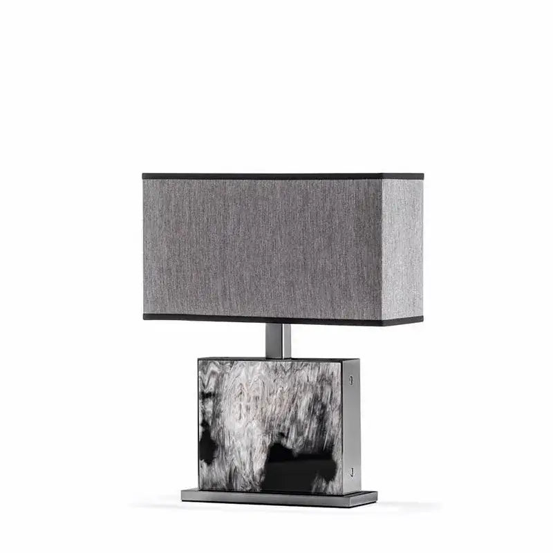 Modern italian luxury table lamp with textured gray fabric shade and metallic black-and-white marbled base for decorbites