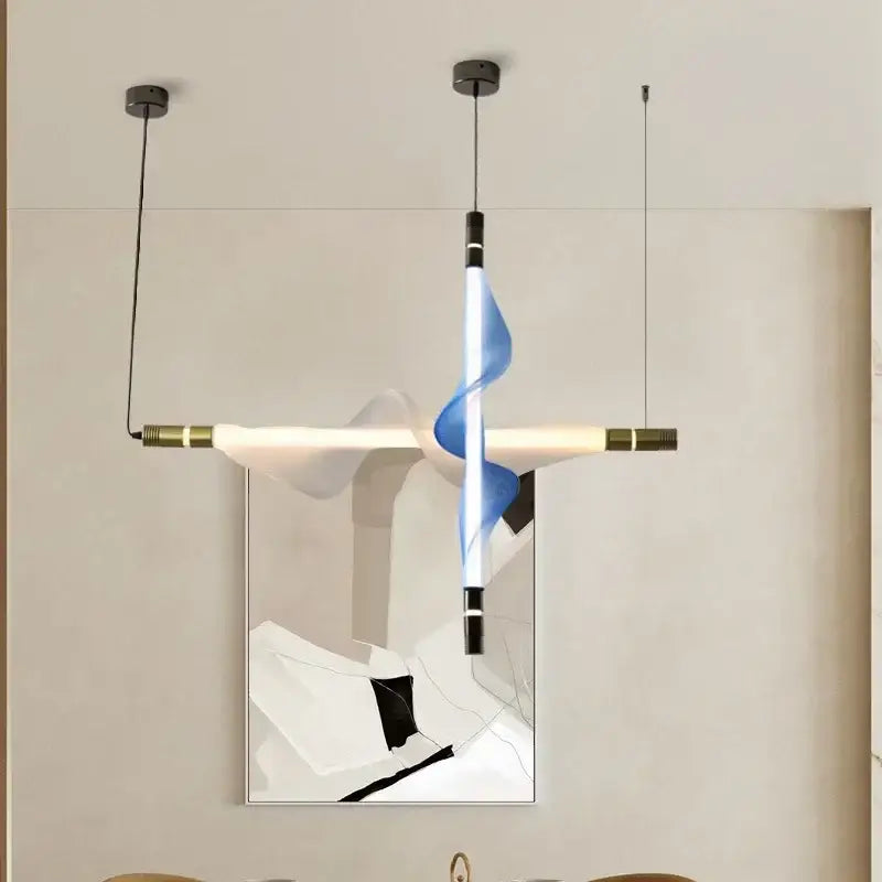 Modern italian style pendant light with a blue translucent spiral and matte black brass bars for kitchen and dining room decorbites italian style pendant
