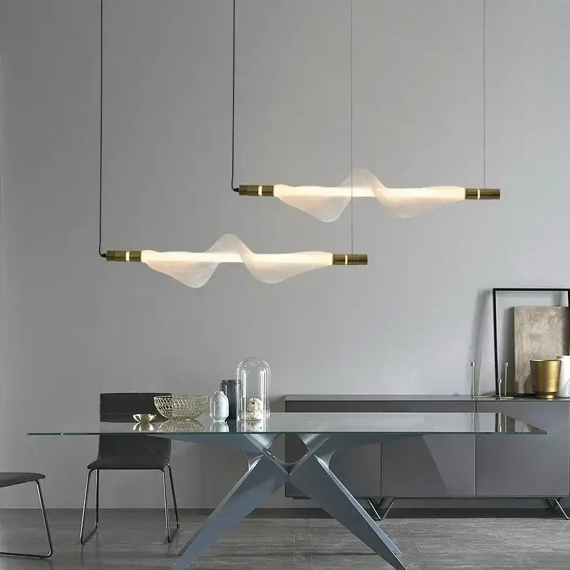 Modern italian style pendant light with flowing translucent white glass and polished brass ends for kitchen and dining decorbites italian style pendant