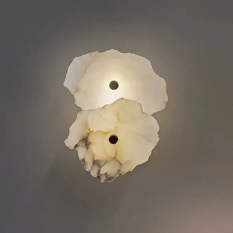 Modern ivory white marble led ceiling light with sculptural alabaster petal layers and central circular aperture decorbites ivory white