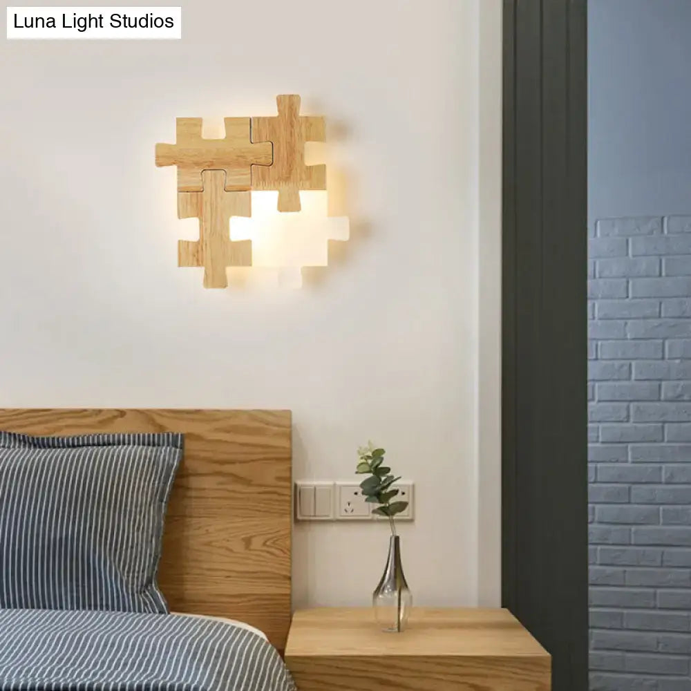 Modern jigsaw light wood wall lamp with warm LED lighting sconce ideal for bedroom ambient lighting