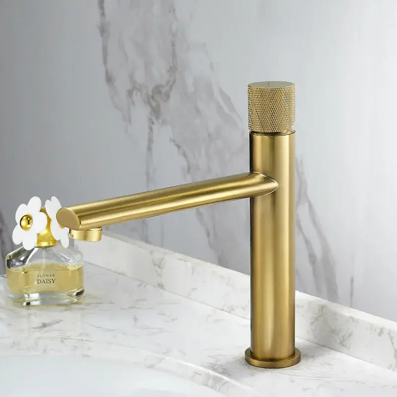 Modern knurled brushed gold basin faucet with textured handle and minimalist design by decorbites brushed gold collection