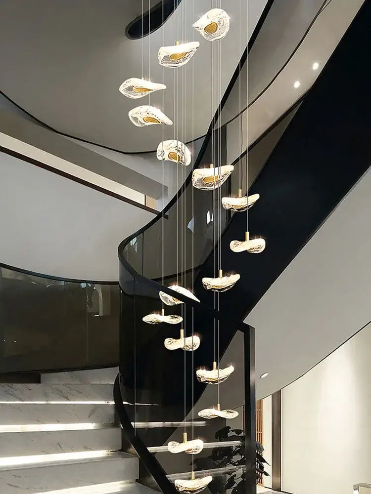 Modern leaf crystal glass staircase chandelier with shell-shaped translucent glass fixtures by decorbites crystal glass