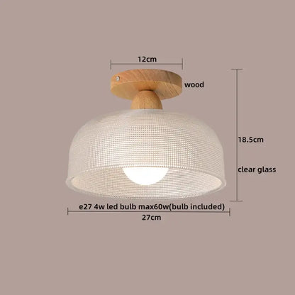 A warm wood modern leaf glass ceiling light with decorbites clear glass dome and intricate woven texture for hallway lighting