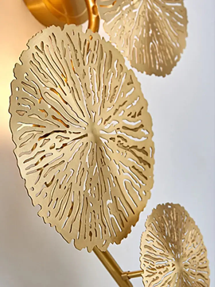 Modern leaf gold iron wall sconce with intricate lace-like cutout patterns for living room decorbites iron wall decorbites iron wall sconce