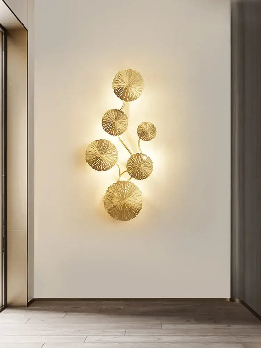 Modern leaf gold iron wall sconce with multiple circular discs on slender stems for living room decorbites iron wall