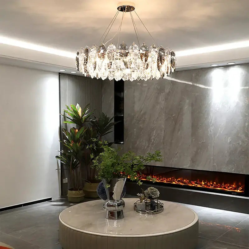 Modern leaf gold and silver crystal pendant light with clear faceted crystals and polished metal frame for living room decorbites gold silver