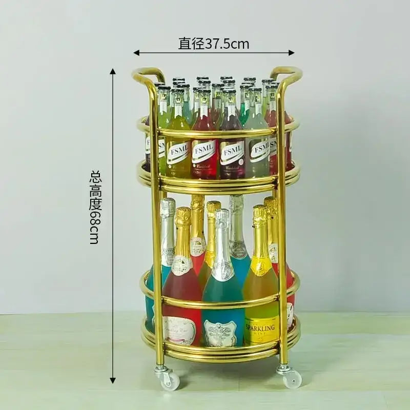 Gold two-tiered metal beauty salon trolley with rounded shelves and caster wheels for modern salon storage
