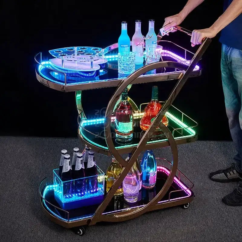 A sleek modern led beauty salon trolley with metallic frame and glass shelves illuminated by colorful led lights