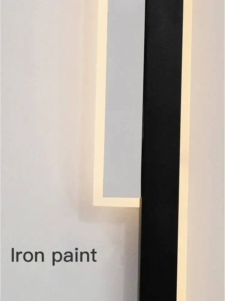 Modern led black wall lamp with sleek black frame and warm gold glow for living room decorbites led black style