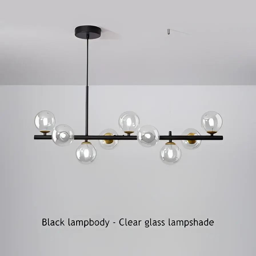 Modern black metal chandelier with clear glass globe shades featuring a head ring design for stylish lighting