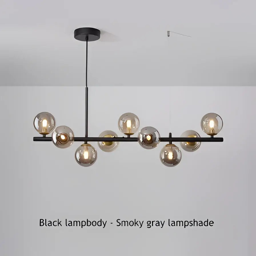 Modern black metal chandelier with smoky gray glass globe shades featuring a head ring chandelier design