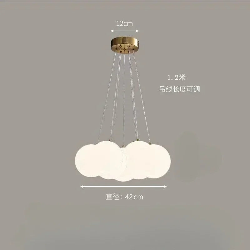 A modern cloud-shaped luxury led pendant lamp with frosted milk white glass orbs for living room lighting decor