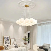 Cloud-shaped luxury led pendant light with frosted milk white glass spheres and gold-toned ceiling mount for living room