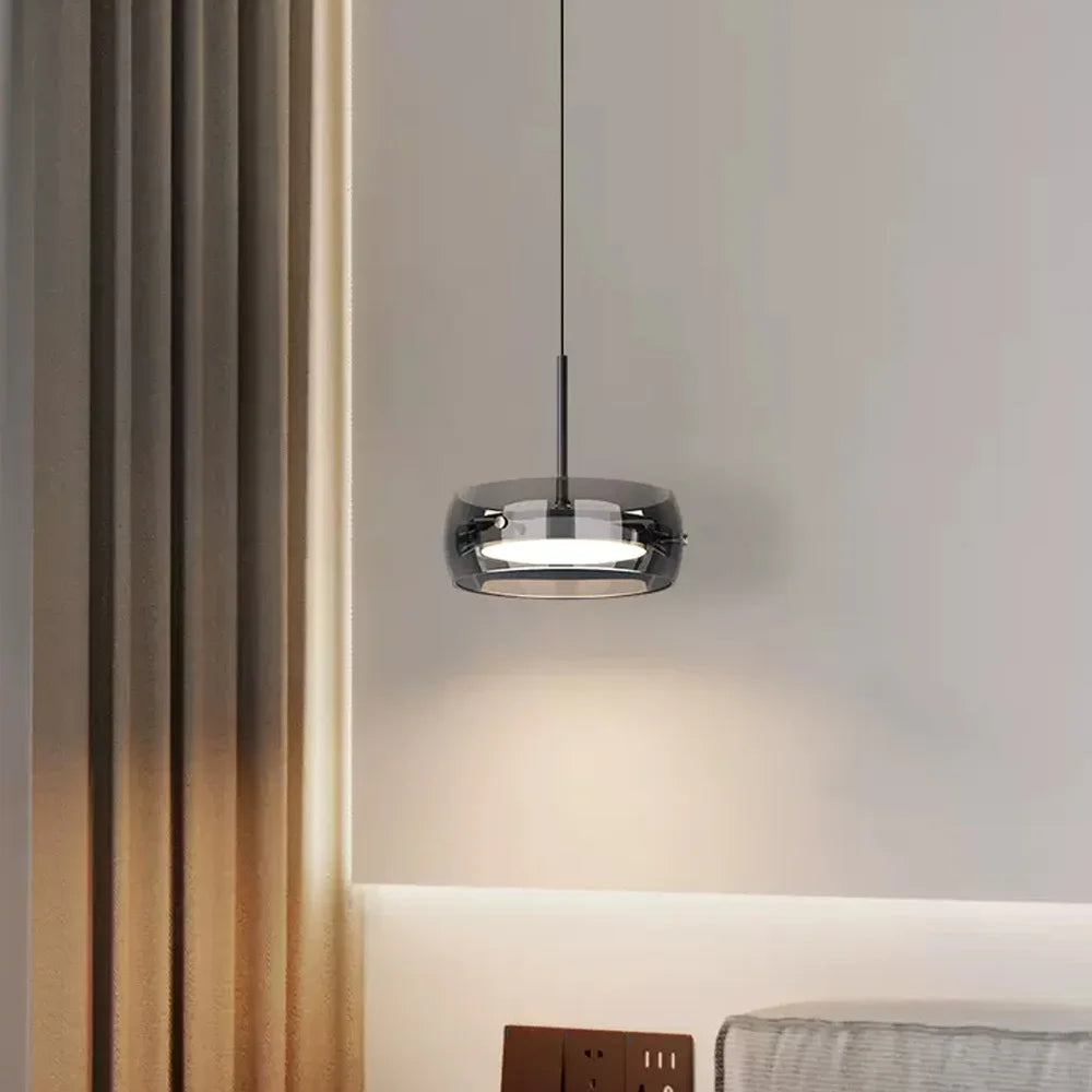 Modern led glass pendant lights with circular chrome metal frame and transparent glass shade for indoor warm lighting