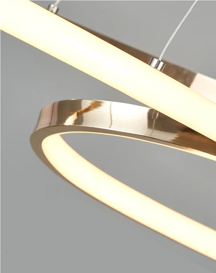 Modern led gold-toned circular pendant light with remote dimming and polished electroplated metal accents for dining room