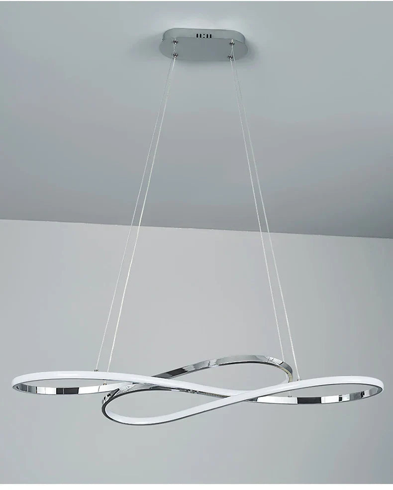 Modern led chrome and white infinity loop pendant light with sleek electroplated design and remote dimming for dining room decor