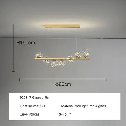Modern led long ceiling chandelier with gold-toned wrought iron frame and clear glass globe bulbs for dining room lighting