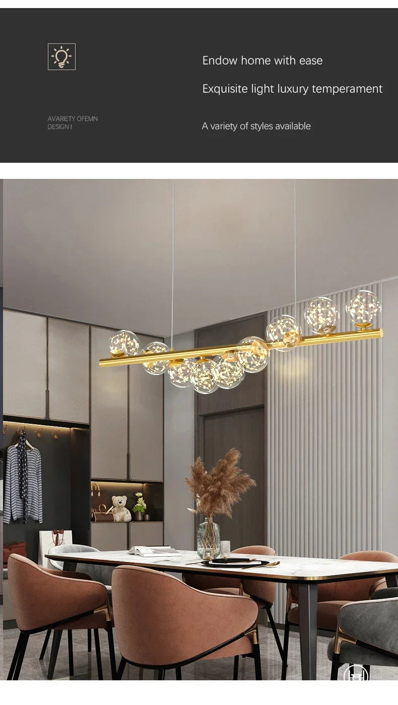 Gold-toned modern led long ceiling chandelier with clear glass globe shades hanging above a dining table for home decor