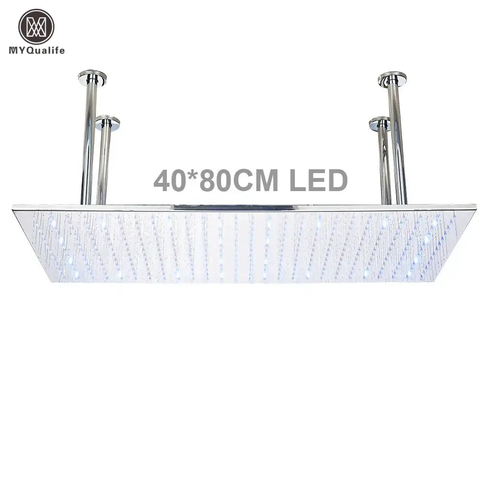 Chromed rectangular led rainfall shower head with integrated water jets and sleek modern design for luxury bathroom use