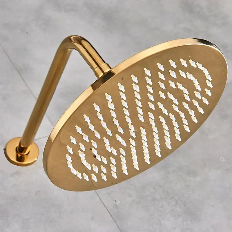 Modern led round gold shower head with sleek metallic finish and diamond-shaped spray nozzles in concentric circles
