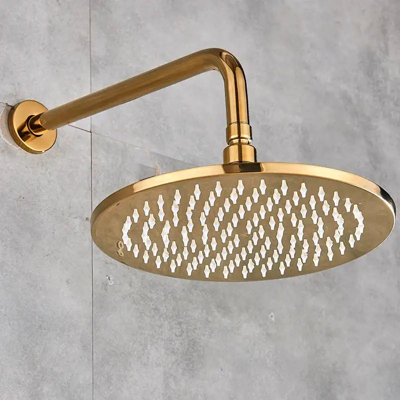 Modern led round gold shower head with a sleek metallic finish and diamond shaped spray holes for bathroom use