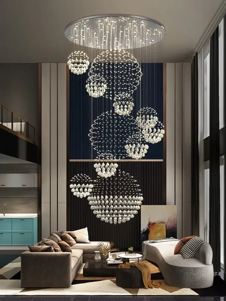 A modern led spiral crystal ball chandelier with cascading clear crystal spheres on a sleek metallic frame decorbites crystal ball