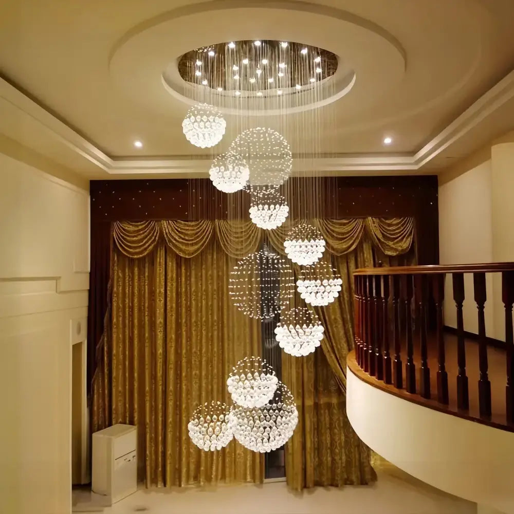 Modern led spiral crystal ball chandelier with cascading crystal orbs and warm glow by decorbites crystal ball decor