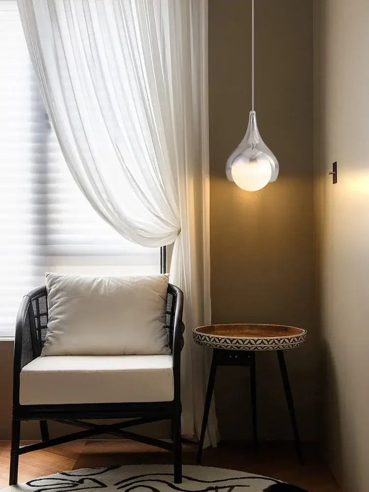Modern led water droplet ceiling chandelier features a sleek frosted glass globe with metallic frame for dining room decorbites led water lighting