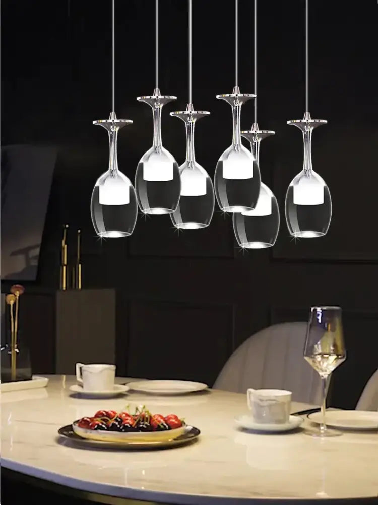 Modern led wine glass pendant lights featuring five clear glass wine glasses with bright white decorbites led wine bulbs