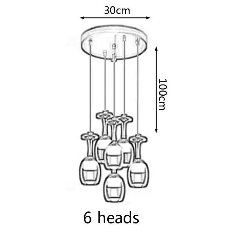 A modern glass chandelier with six inverted led wine glass pendant lights from decorbites for dining room decor