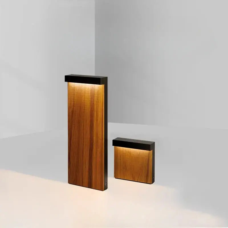 Modern led wood grain lawn light with wooden body, sleek black tops, and warm ambient glow for garden pathways