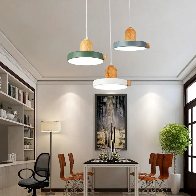 Three modern led wood iron pendant lights with wooden tops and green white and blue shades for bedroom decorbites lighting