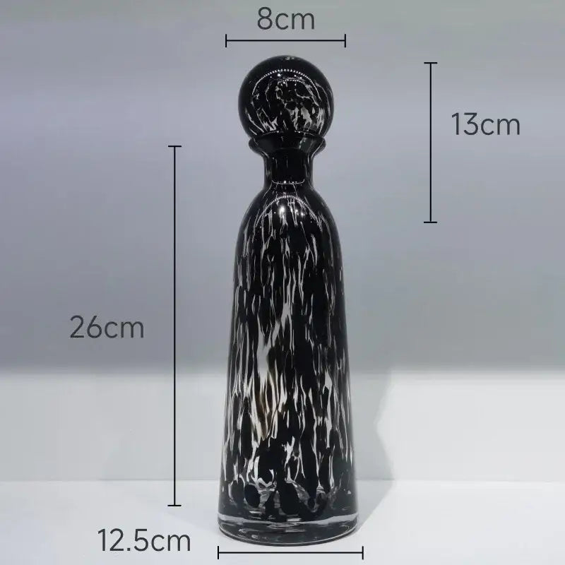 A sleek black and white marbled glass decanter with leopard texture measuring 26cm for modern decorbites decor