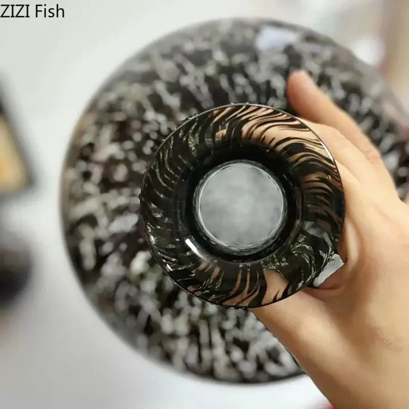 Glossy black and white marbled glass vase with swirling leopard texture base for dining room decorbites leopard texture