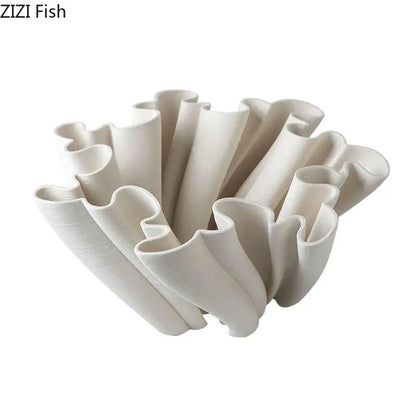 Cream-colored ceramic vase with flowing ruffled ridges decorbites bud shape for modern living room decor