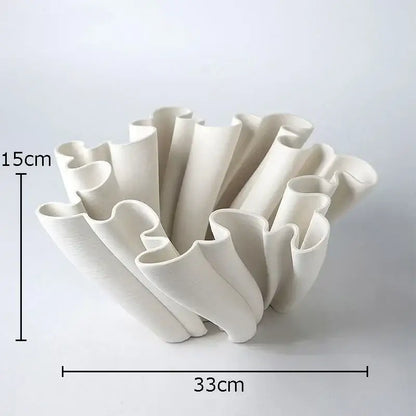 Modern light blue bud shape ceramic vase with sculptural white ruffled tube arms for living room decorbites decor