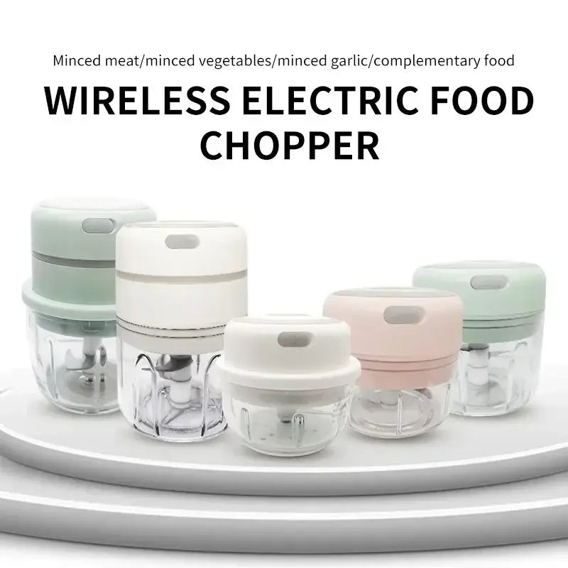 Modern light blue electric food chopper with compact wireless design, glass base, and pastel silicone lid for kitchen use