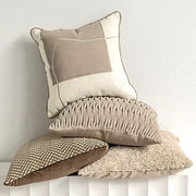 Beige and cream patchwork pillow covers with textured fabric panels for modern light coffee decorbites decor