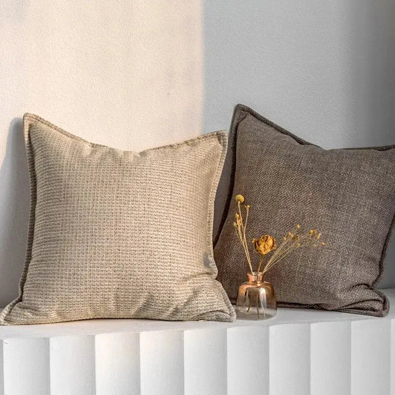 Beige textured linen throw pillow cover with dark brown piping in modern light coffee decorbites light coffee style decor