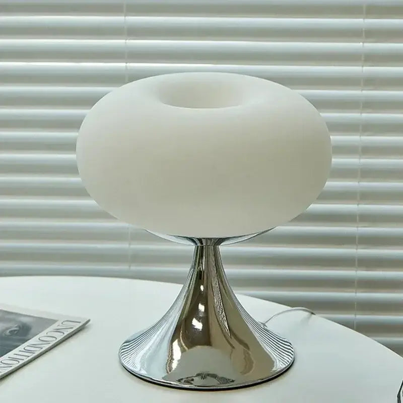 A sleek modern glass desk lamp with frosted white glass globe and polished chrome base for decorbites glass desk
