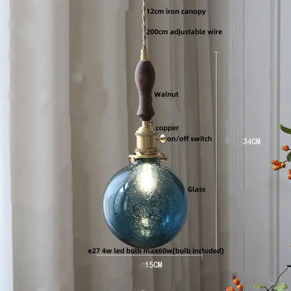Modern lime and teal blue bubble glass ball pendant light with blue textured glass and walnut iron canopy by decorbites